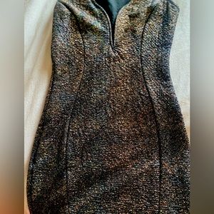 Fitted multi colored dress, low cut.